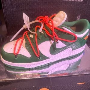 Nike dunks low x off white 
Pine green